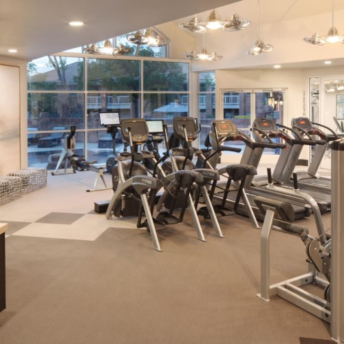 State-of-the-art amenities a room with exercise equipment